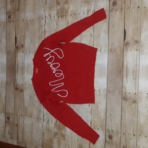 Joyland sweater red says MERRY